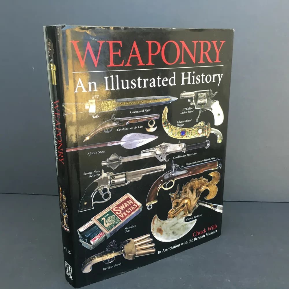WEAPONRY AN ILLUSTRATED HISTORY-CHUCK WILLS Hard Cover With DJ