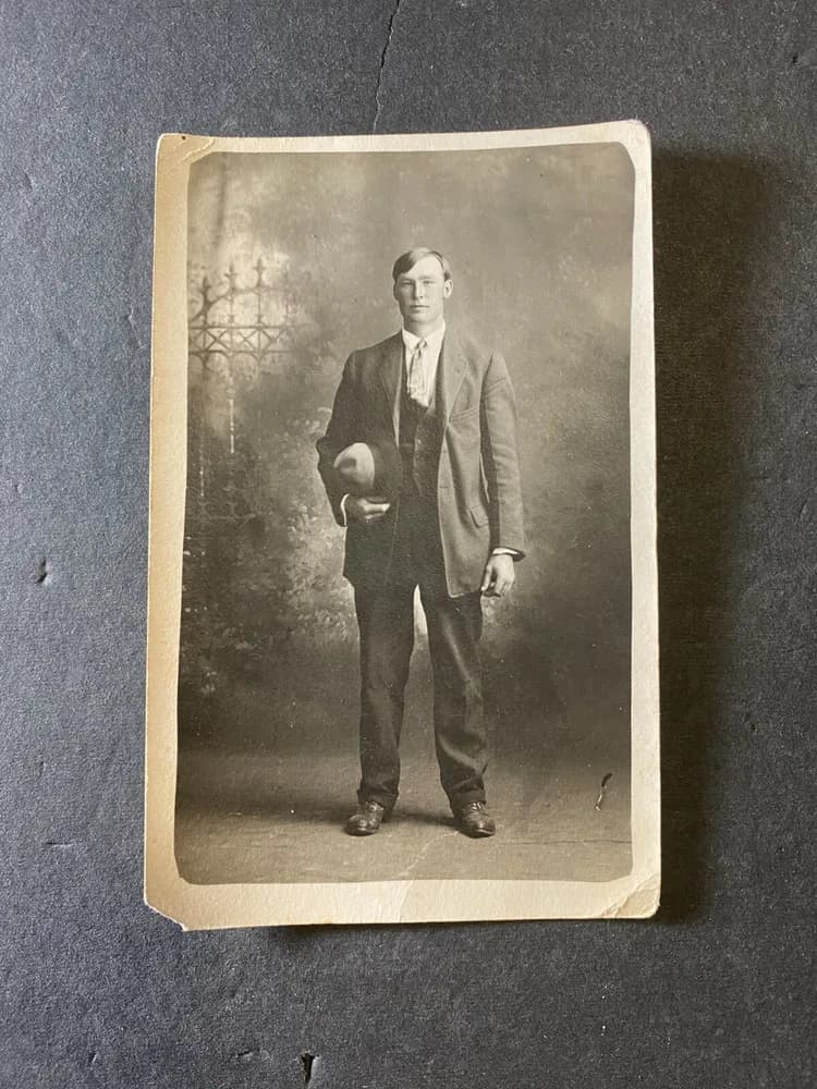 Vintage Postcard Real Photo Black And White man holding hat profile